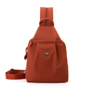 Orange Versatile Women's Convertible Mini Backpack & Sling Bag - Stylish Anti-Theft Oxford Cloth Daypack, Fits 9.7in iPad